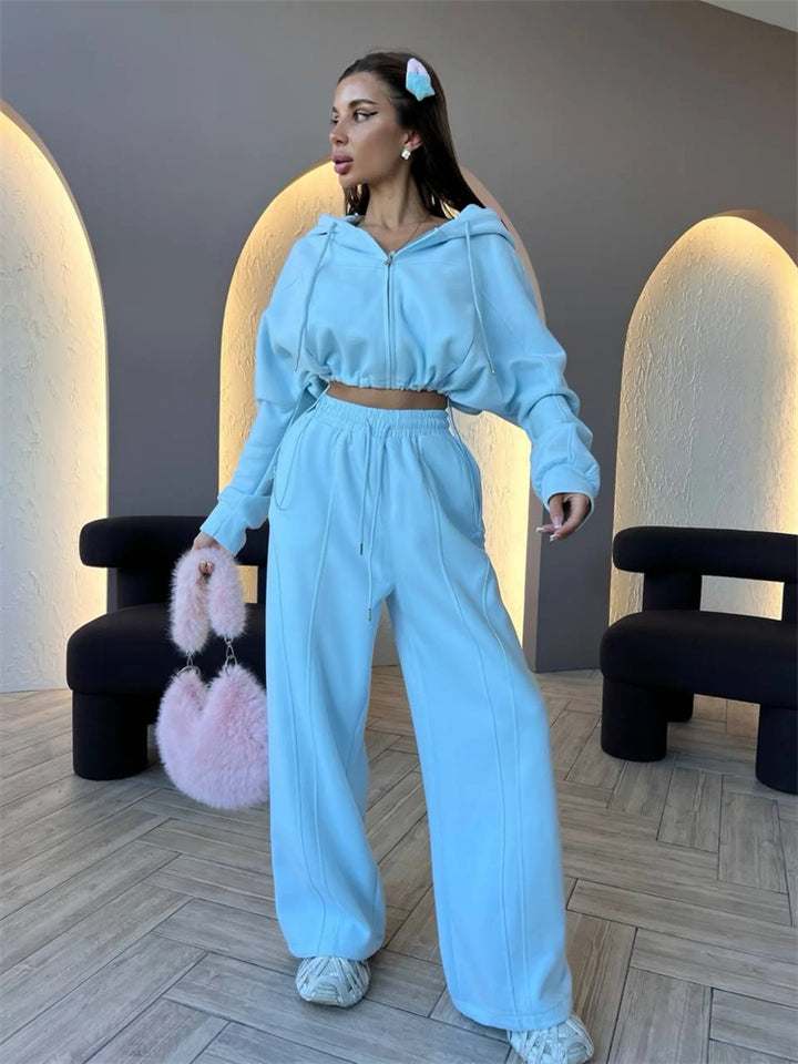 Kvinnors sportiga crop top och lösa joggingbyxor set Mirla-Eva Jonsson