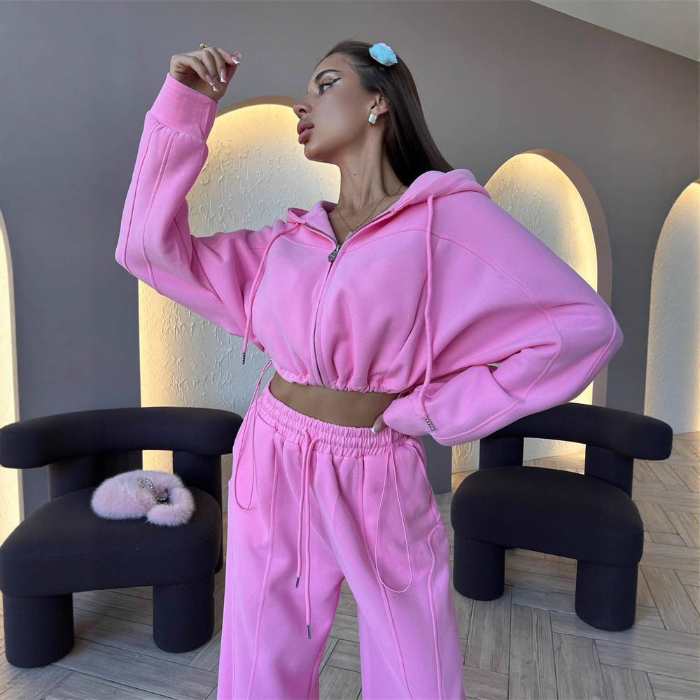 Kvinnors sportiga crop top och lösa joggingbyxor set Mirla-Eva Jonsson