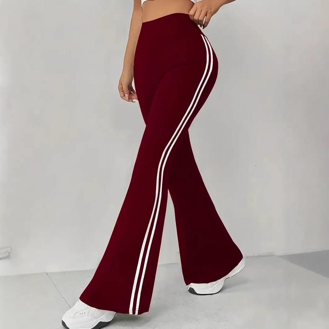 Kvinnors sportiga flare leggings med ränder Mirla-Eva Jonsson