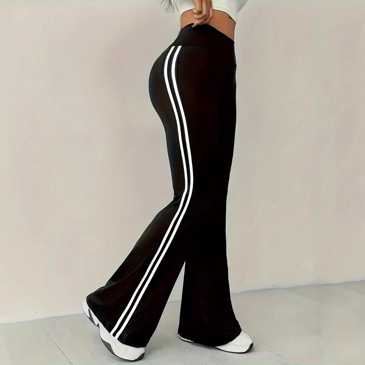 Kvinnors sportiga flare leggings med ränder Mirla-Eva Jonsson