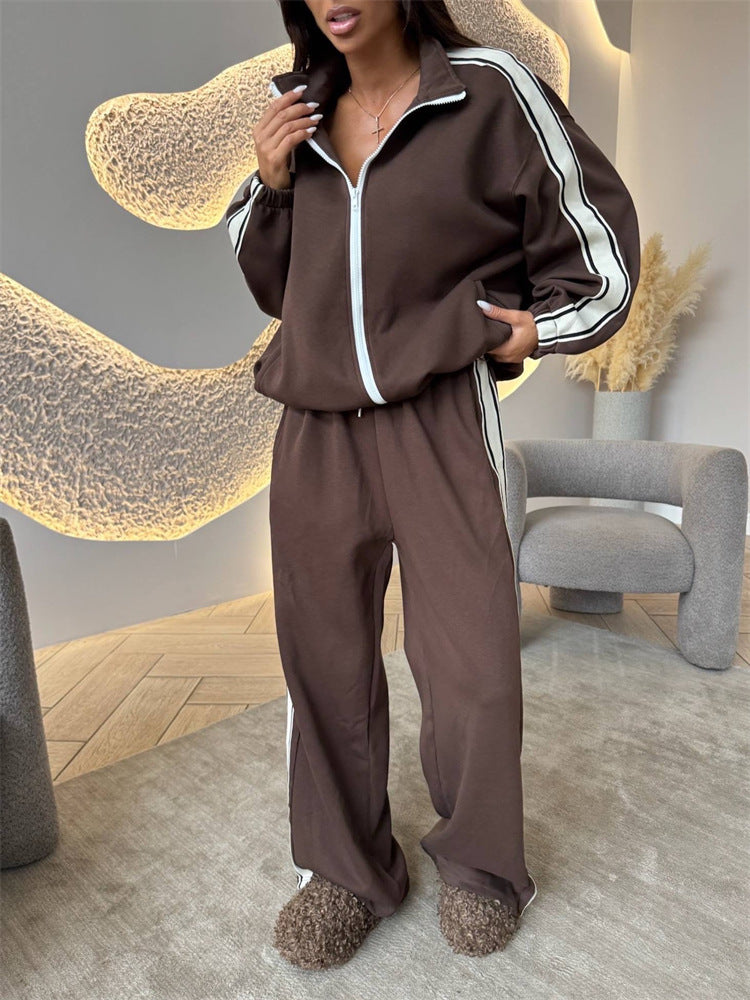Kvinnors sportiga fleece joggingset med hög sidoklyvning Mirla-Eva Jonsson