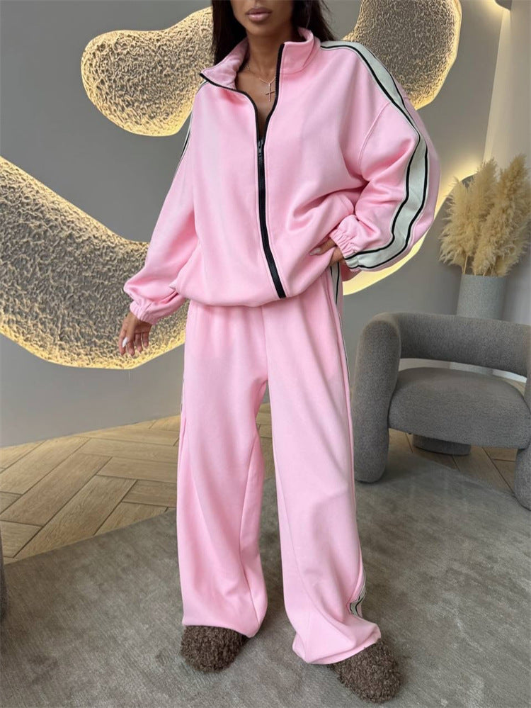 Kvinnors sportiga fleece joggingset med hög sidoklyvning Mirla-Eva Jonsson