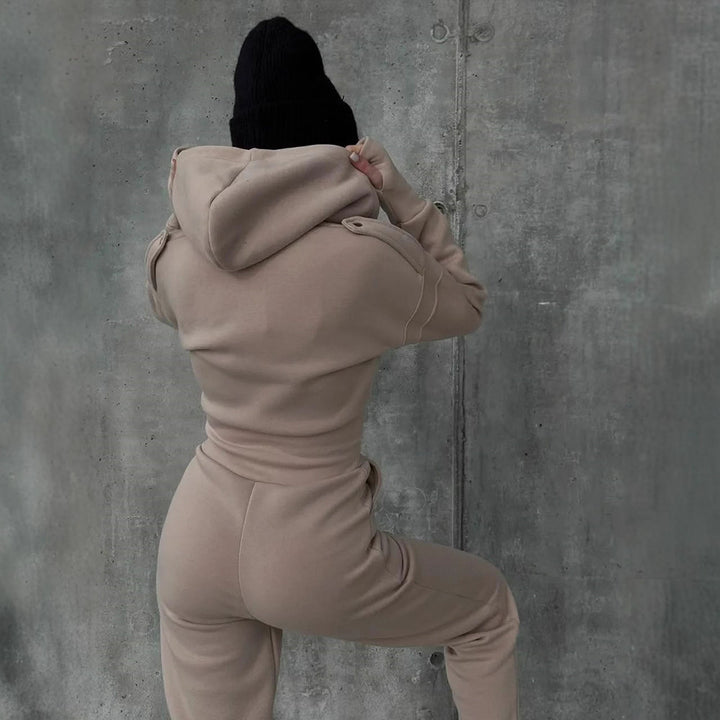 Kvinnors sportiga fleece jumpsuit med dragkedja och hög krage Mirla-Eva Jonsson