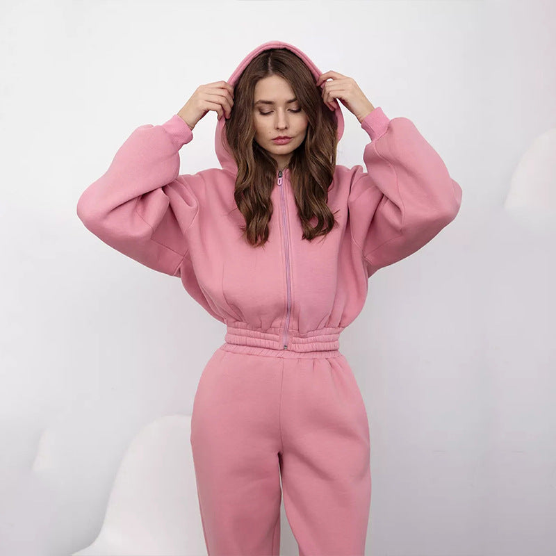 Kvinnors sportiga fleece jumpsuit med huva och lös passform Mirla-Eva Jonsson