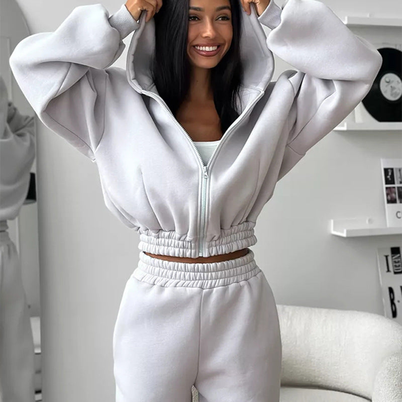 Kvinnors sportiga fleece jumpsuit med huva och lös passform Mirla-Eva Jonsson