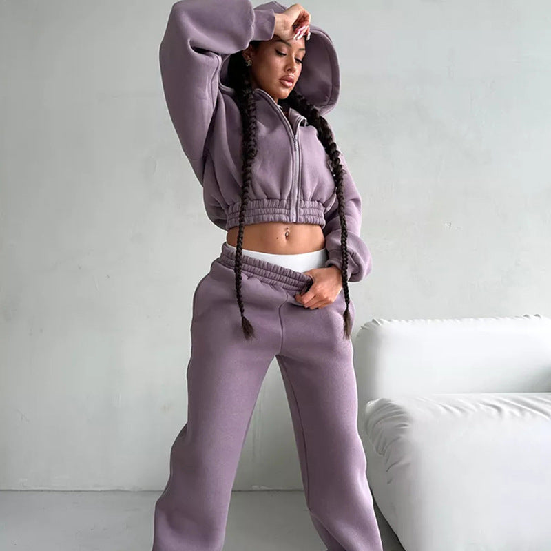 Kvinnors sportiga fleece jumpsuit med huva och lös passform Mirla-Eva Jonsson