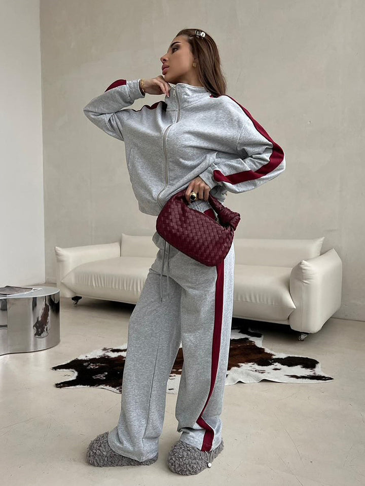 Kvinnors sportiga fleece sweat-set med hög krage och sidostråk Mirla-Eva Jonsson