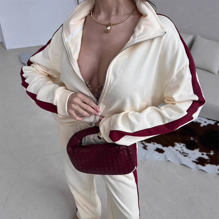 Kvinnors sportiga fleece sweat-set med hög krage och sidostråk Mirla-Eva Jonsson