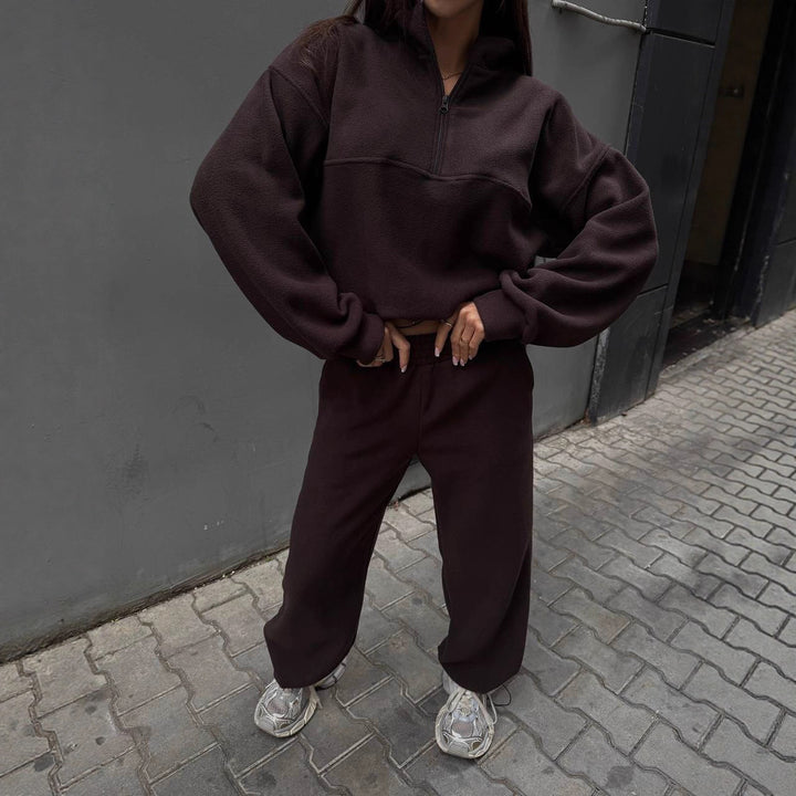 Kvinnors sportiga fleece träningsdräkt med ståkrage och dragkedja Mirla-Eva Jonsson