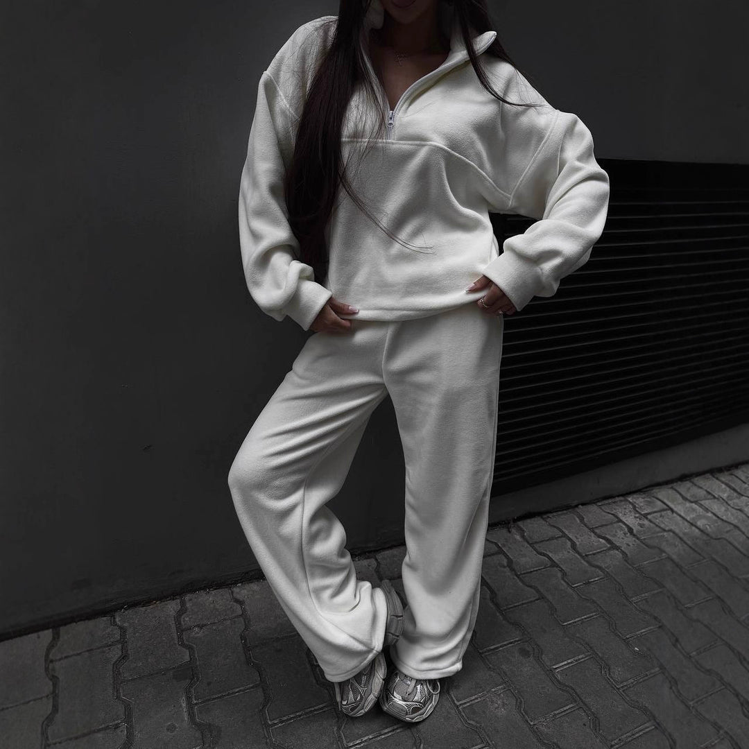 Kvinnors sportiga fleece träningsdräkt med ståkrage och dragkedja Mirla-Eva Jonsson