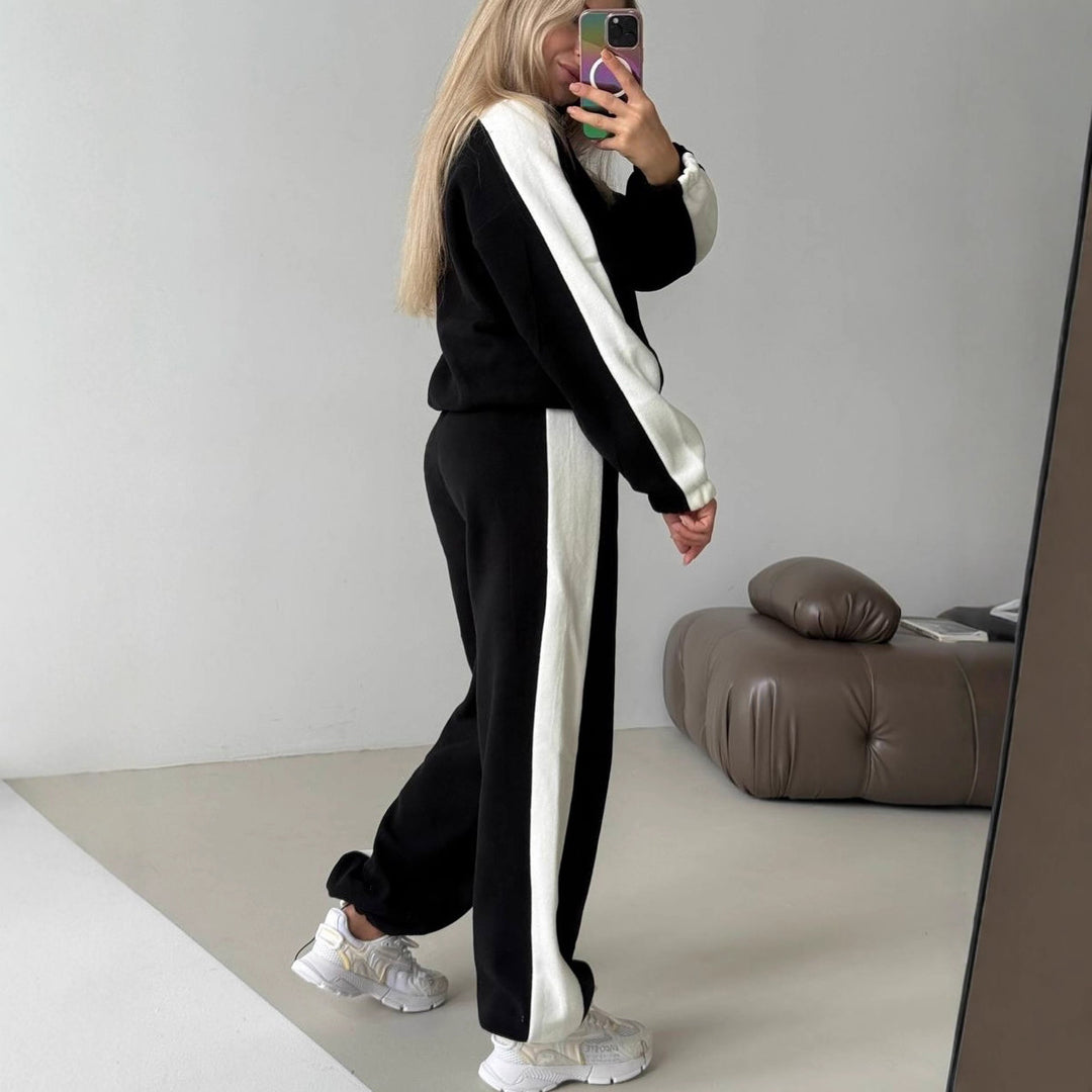Kvinnors sportiga fleece-träningsoverall med hög krage och sidosträck Mirla-Eva Jonsson