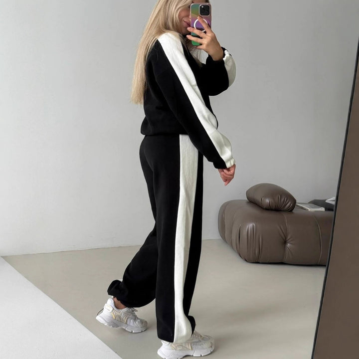 Kvinnors sportiga fleece-träningsoverall med hög krage och sidosträck Mirla-Eva Jonsson