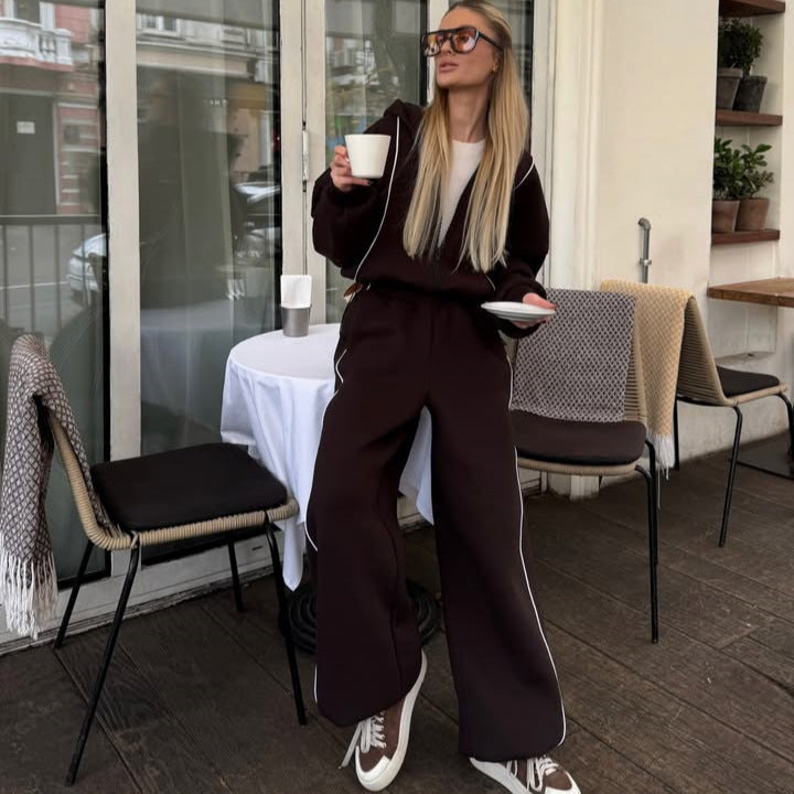 Kvinnors sportiga fritidsoutfit med lös passform och kontrasterande detaljer Mirla-Eva Jonsson