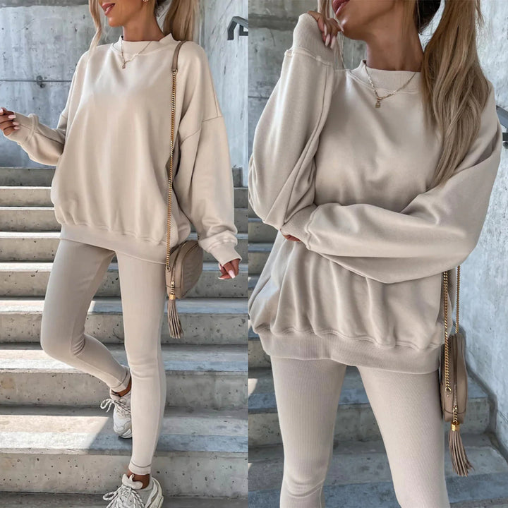 Kvinnors sportiga fritidsset med avslappnad oversized sweatshirt och figurnära leggings Mirla-Eva Jonsson