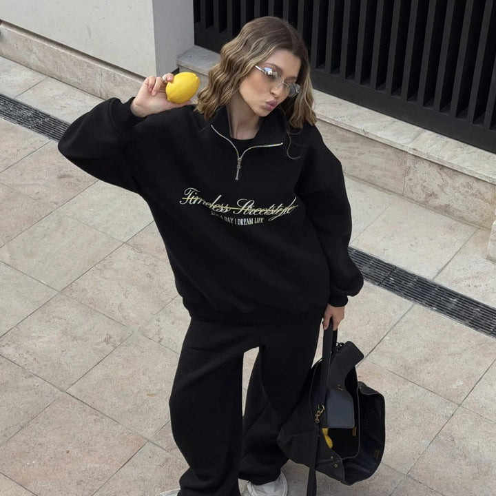 Kvinnors sportiga halvärmad pullover med hel dragkedja och oversize passform-Eva Jonsson