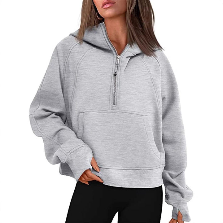 Kvinnors sportiga hoodie med halvstängd dragkedja Mirla-Eva Jonsson