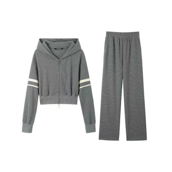 Kvinnors sportiga hoodie och joggingset med sportig dragkedja och bred passform Mirla-Eva Jonsson