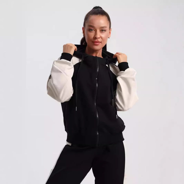 Kvinnors sportiga huvtröja tracksuit med bekväma nagelränder Mirla-Eva Jonsson