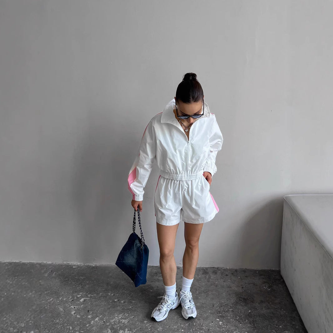 Kvinnors sportiga jumpsuit med hög krage och elastisk midja Mirla-Eva Jonsson