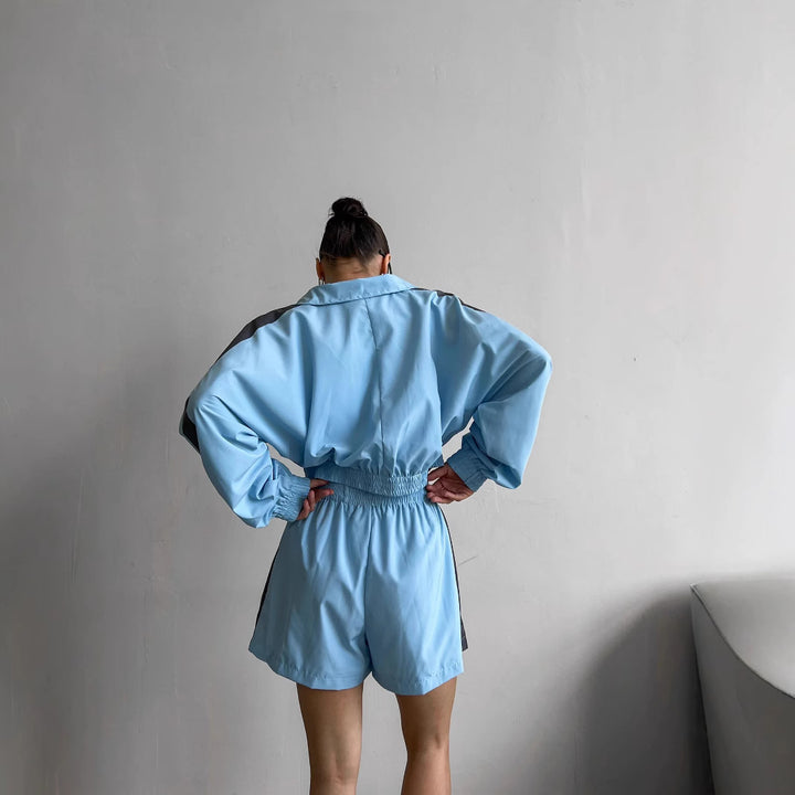 Kvinnors sportiga jumpsuit med hög krage och elastisk midja Mirla-Eva Jonsson