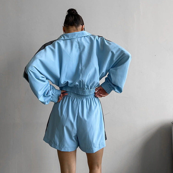 Kvinnors sportiga jumpsuit med hög krage och elastisk midja Mirla-Eva Jonsson