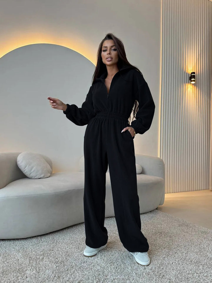 Kvinnors sportiga jumpsuit med hög midjeband och dolda dragkedja Mirla-Eva Jonsson