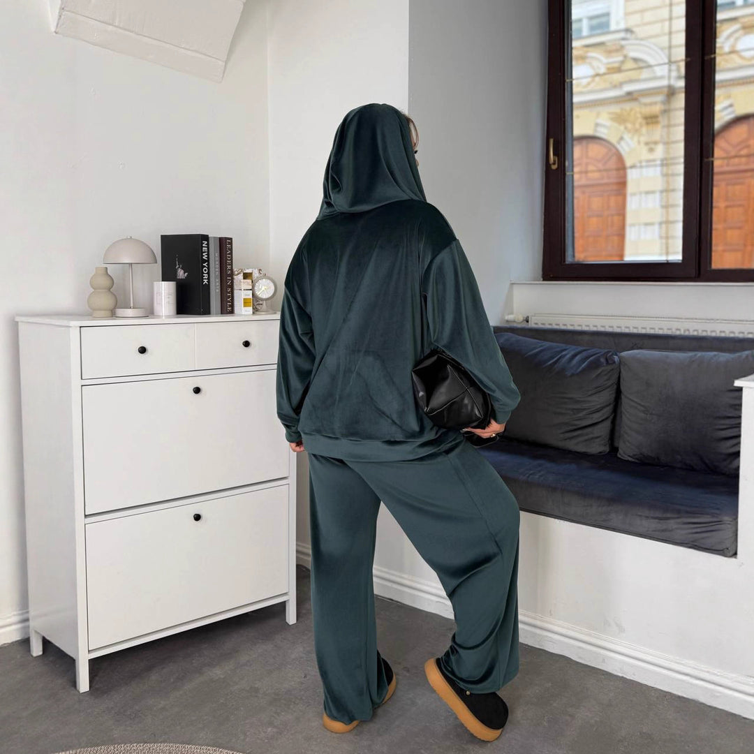 Kvinnors sportiga jumpsuit med huva och elastisk midja Mirla-Eva Jonsson