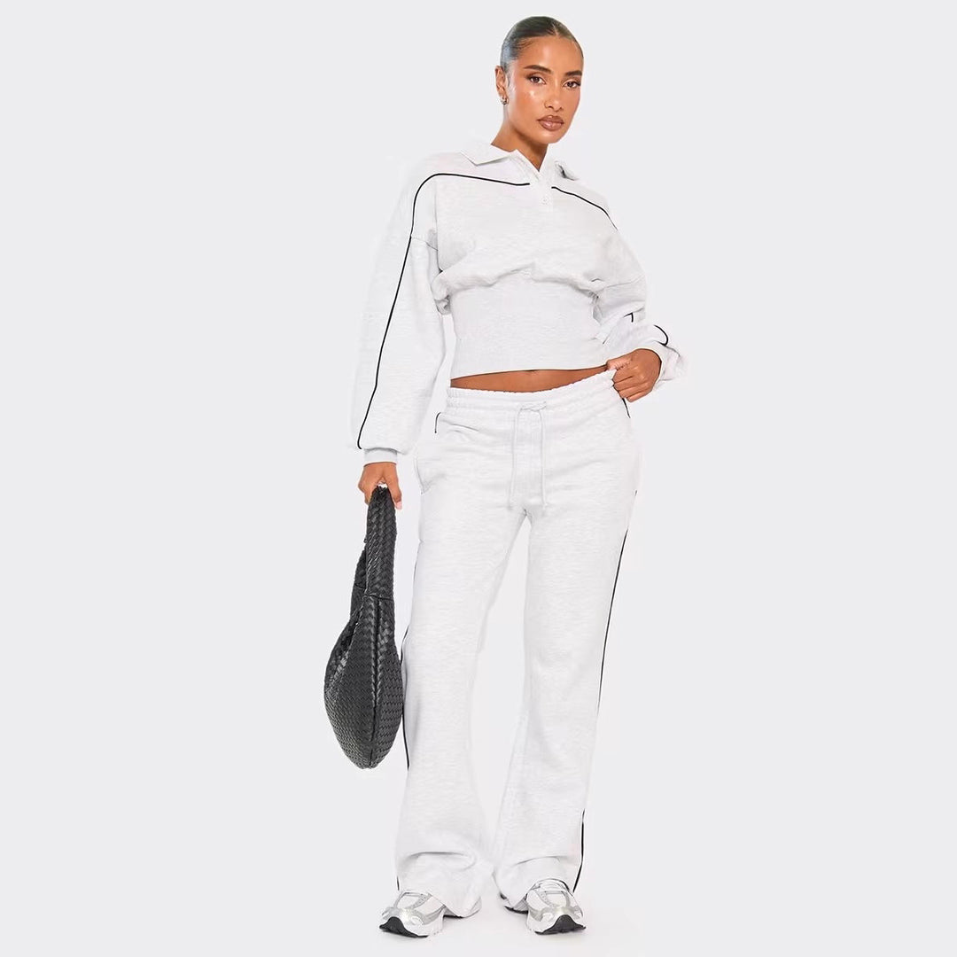 Kvinnors sportiga kortärmad polo och vida joggingbyxor set Mirla-Eva Jonsson