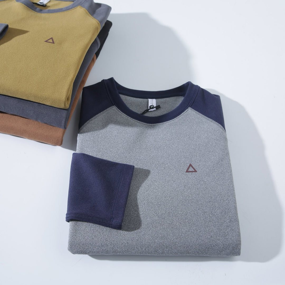 Kvinnors sportiga långärmad skjorta med innovativ skärning Mirla-Eva Jonsson