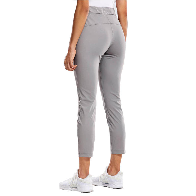 Kvinnors sportiga leggings med elastisk midja och sidofickor Mirla-Eva Jonsson