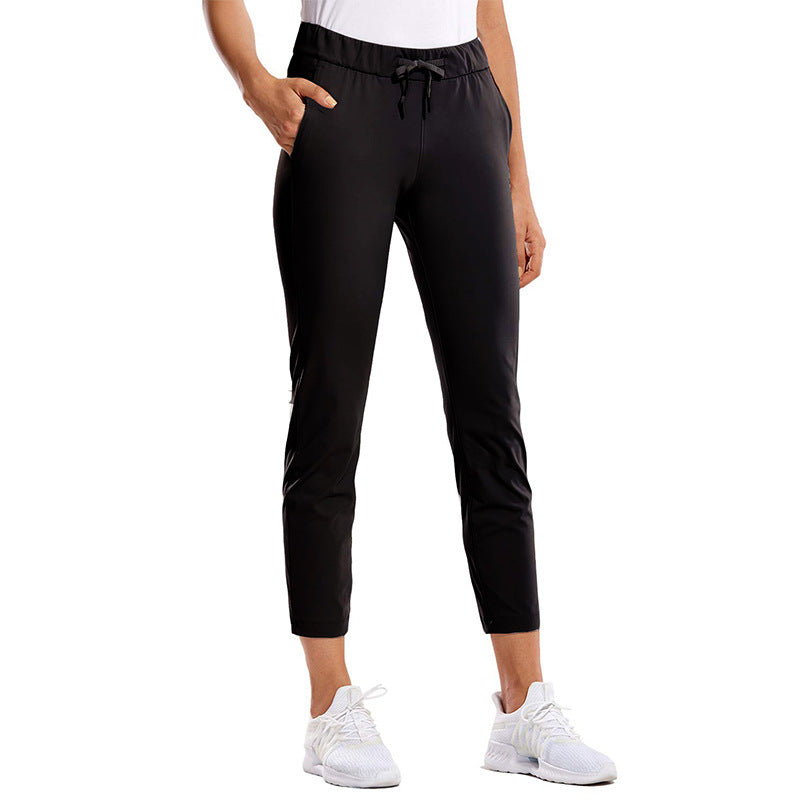 Kvinnors sportiga leggings med elastisk midja och sidofickor Mirla-Eva Jonsson