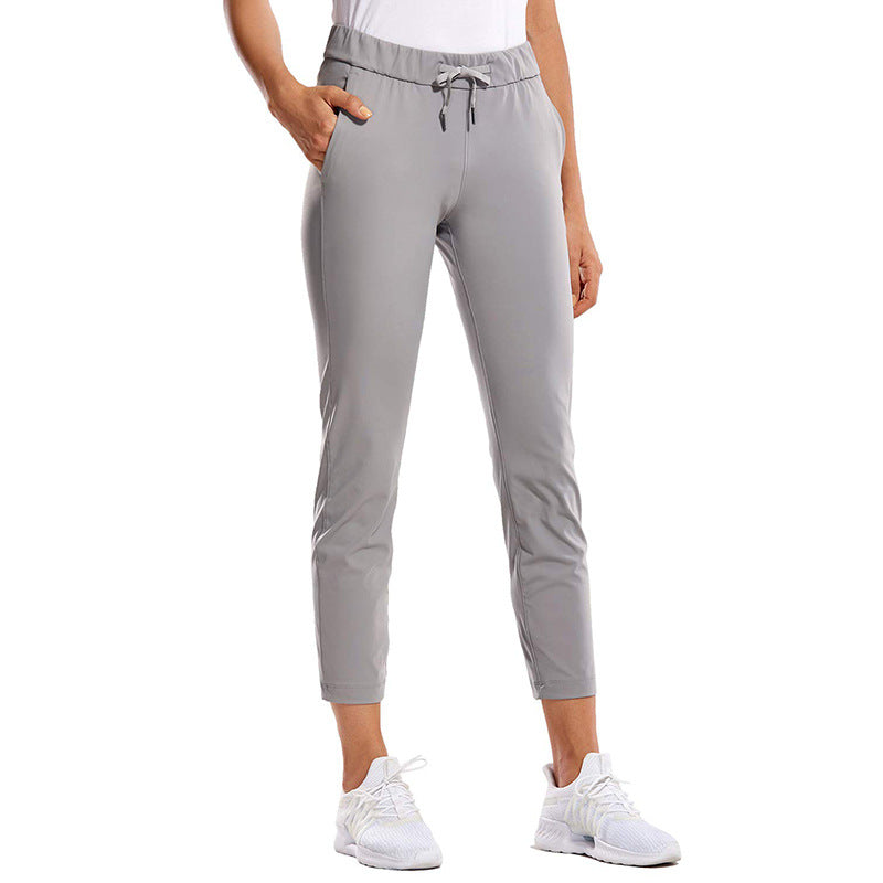 Kvinnors sportiga leggings med elastisk midja och sidofickor Mirla-Eva Jonsson