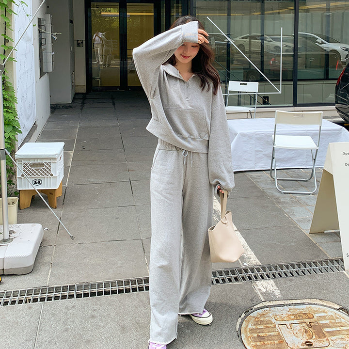 Kvinnors sportiga loungewear-set med avslappnad dragkedja topp och vida byxor Mirla-Eva Jonsson