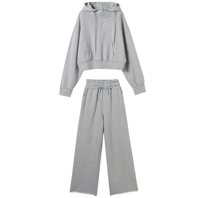 Kvinnors sportiga loungewear-set med avslappnad dragkedja topp och vida byxor Mirla-Eva Jonsson
