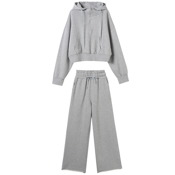 Kvinnors sportiga loungewear-set med avslappnad dragkedja topp och vida byxor Mirla-Eva Jonsson