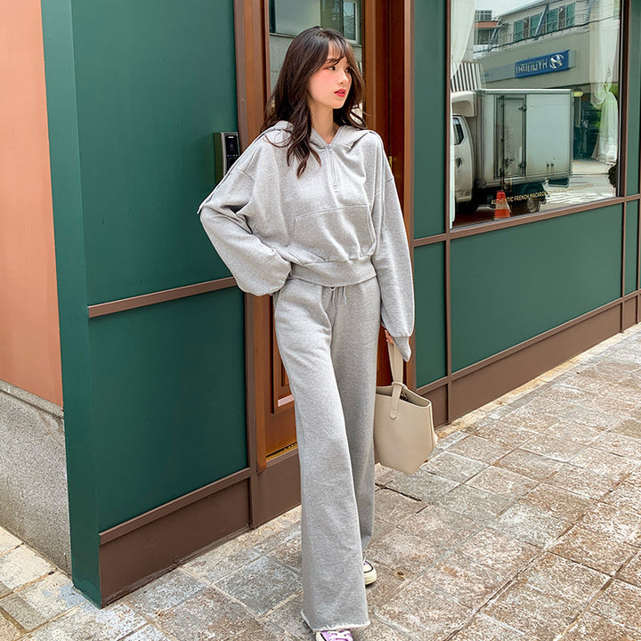 Kvinnors sportiga loungewear-set med avslappnad dragkedja topp och vida byxor Mirla-Eva Jonsson