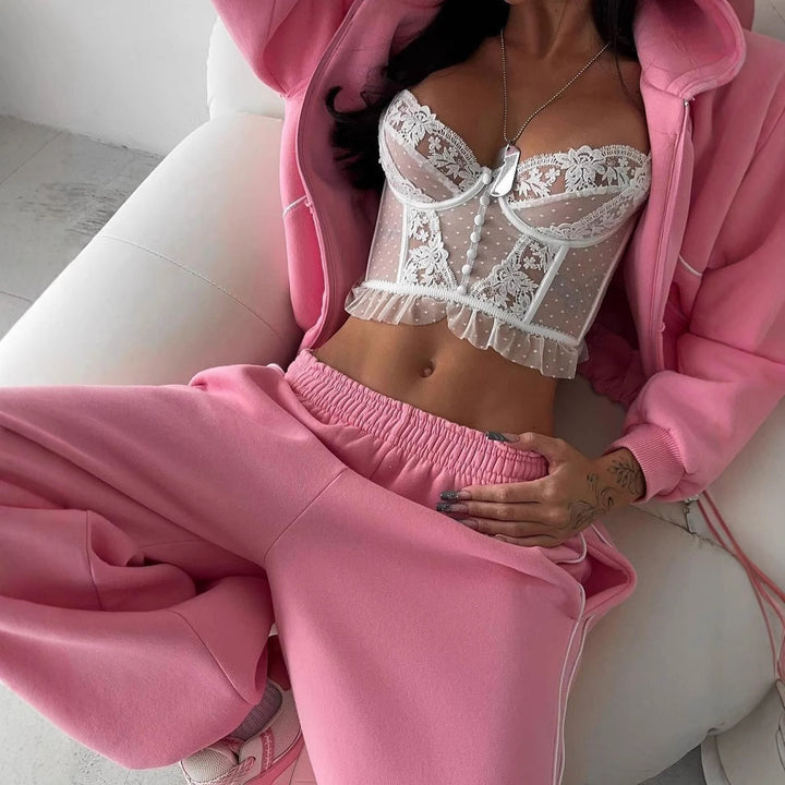 Kvinnors sportiga oversized set i mjuk fleece med kontrastremsor Mirla-Eva Jonsson