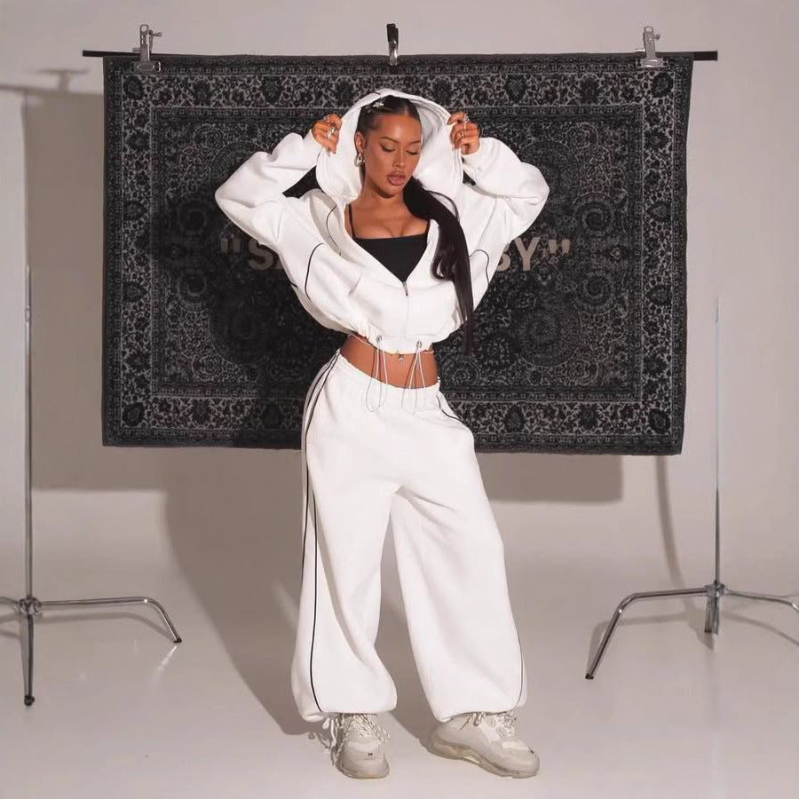 Kvinnors sportiga oversized set i mjuk fleece med kontrastremsor Mirla-Eva Jonsson