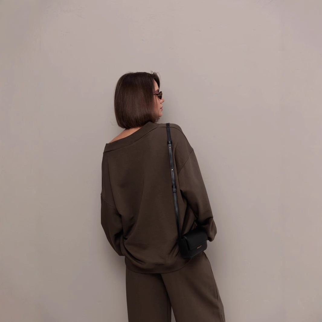 Kvinnors sportiga oversized sweatshirt med V-hals och långa ärmar Mirla-Eva Jonsson