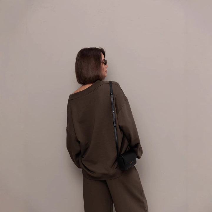 Kvinnors sportiga oversized sweatshirt med V-hals och långa ärmar Mirla-Eva Jonsson
