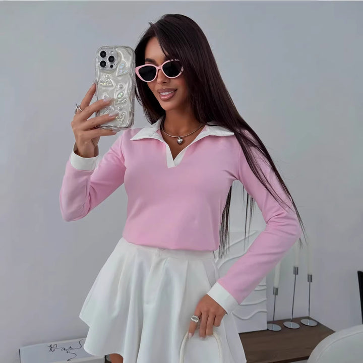 Kvinnors sportiga polo shirt med elegant krage och långa ärmar Mirla-Eva Jonsson