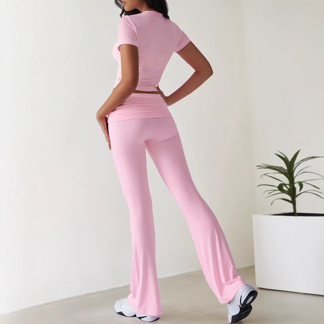 Kvinnors sportiga set med figurnära topp och utsvängda leggings Mirla-Eva Jonsson