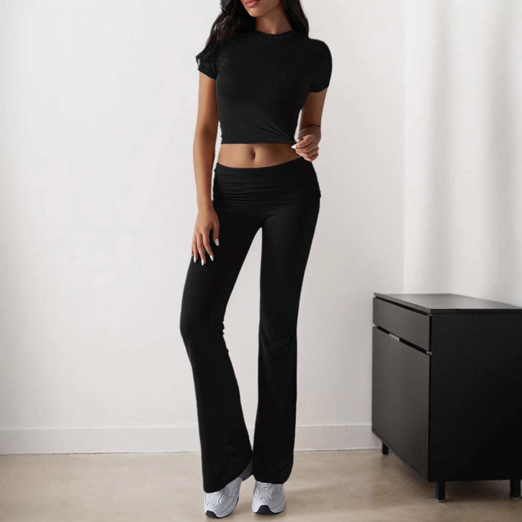 Kvinnors sportiga set med figurnära topp och utsvängda leggings Mirla-Eva Jonsson