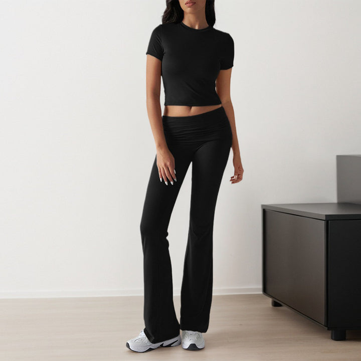 Kvinnors sportiga set med figurnära topp och utsvängda leggings Mirla-Eva Jonsson