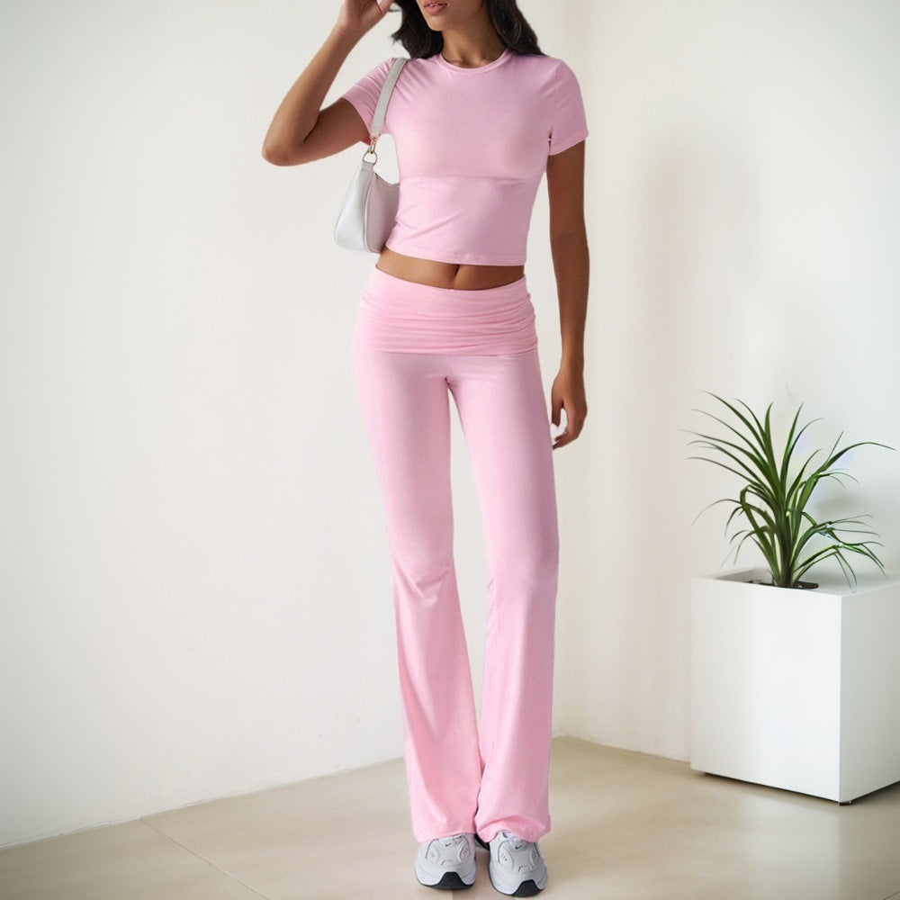 Kvinnors sportiga set med figurnära topp och utsvängda leggings Mirla-Eva Jonsson