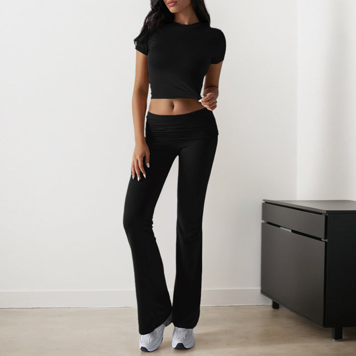 Kvinnors sportiga set med figurnära topp och utsvängda leggings Mirla-Eva Jonsson
