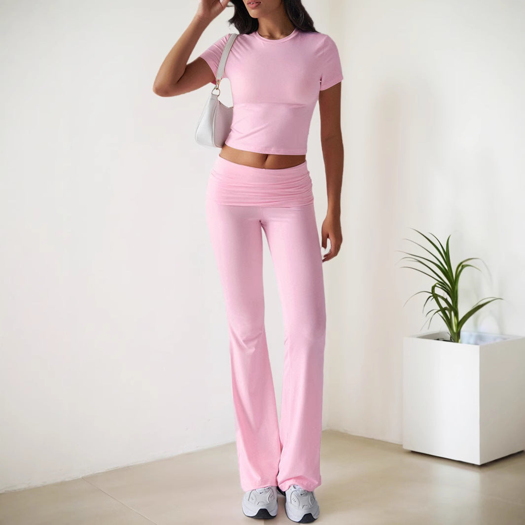 Kvinnors sportiga set med figurnära topp och utsvängda leggings Mirla-Eva Jonsson