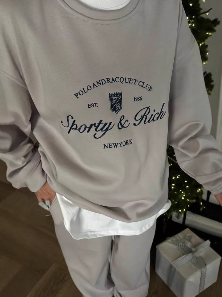 Kvinnors sportiga sweatshirt med lyxigt tryck och avslappnad passform Mirla-Eva Jonsson