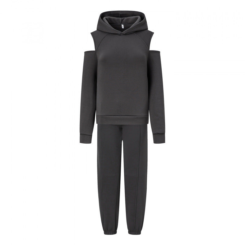 Kvinnors sportiga sweatshirt-set med djup ringning och sidraglansärmar Mirla-Eva Jonsson