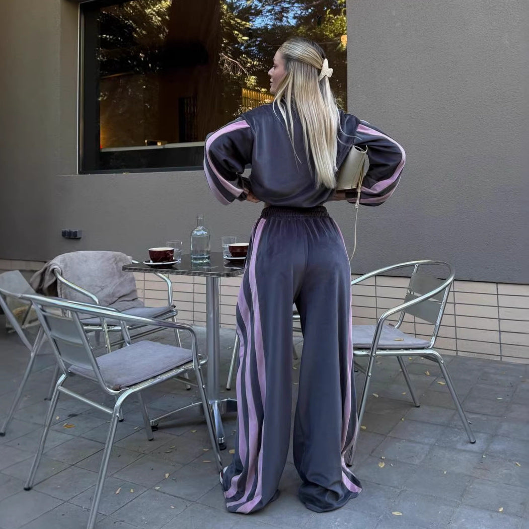 Kvinnors sportiga velour träningsdräkt med kontrasterande färgstripes Mirla-Eva Jonsson